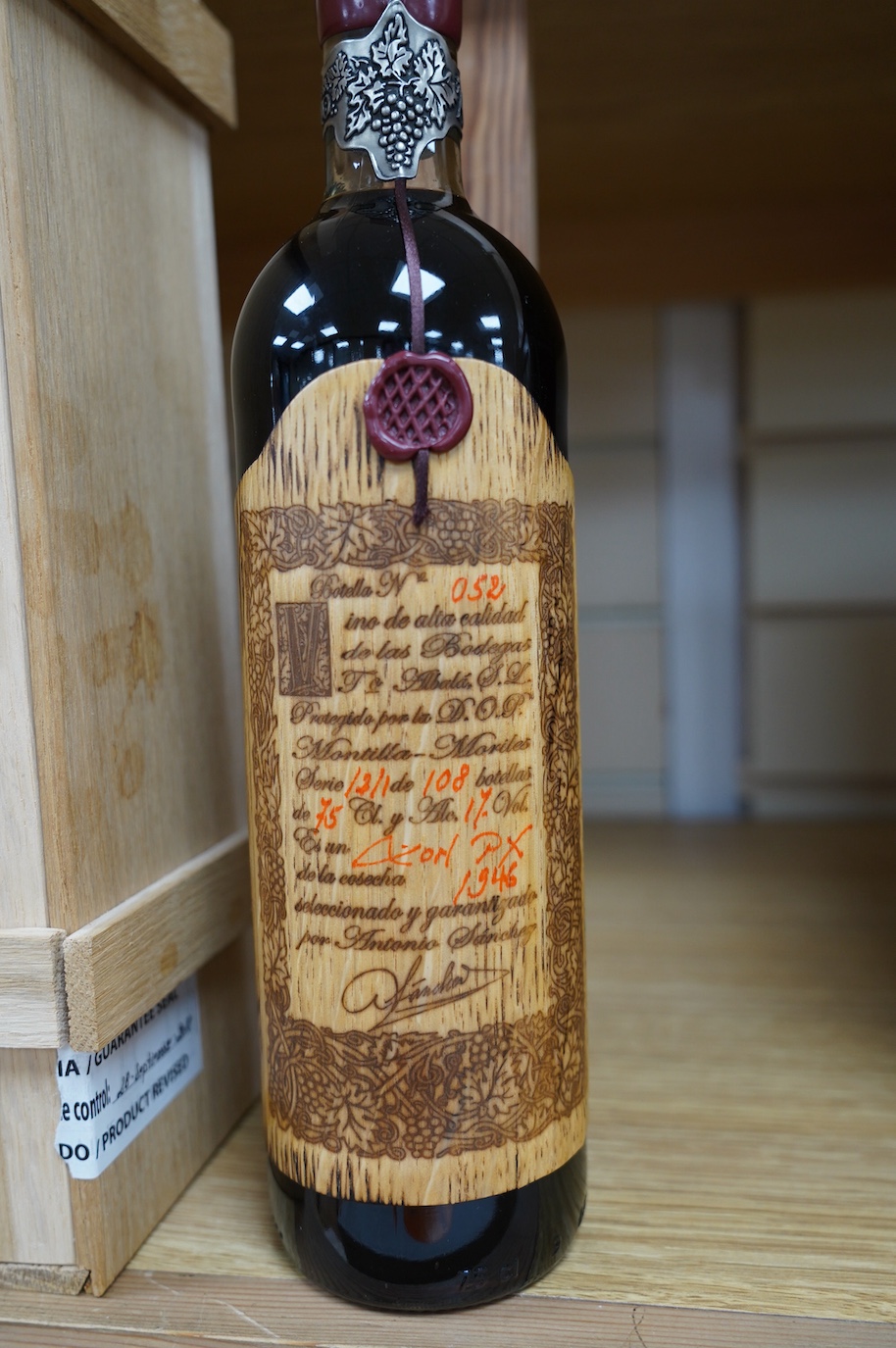 A wood cased bottle of Don Px Convento 1946 dessert sherry, bottled in 2013. Condition - good